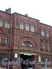 Наб. реки Волковки, д. 3. Здания бывшей Волковской богадельни. Фрагмент фасада. Фото июль 2009 г.