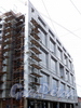 Певческий пер., д. 12. Работы на фасаде строящегося здания. Фото апрель 2011 г.
