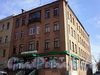 Большеохтинский пр., д. 21. Общий вид здания. Магазин «Цветоптрозница». Фото апрель 2009 г.