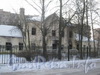 Пр. Ветеранов, дом 141, корп. 2. Фасад сгоревшего дома со стороны Добрушской ул. Фото февраль 2012 г.