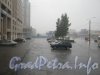 Дождь на автостоянке перед гостиницей. Вид в сторону ул. Руднева. Фото 7 августа 2012 г.