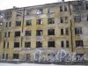 Тихорецкий пр., дом 5, корпус 1. Вид со стороны дома 5 корпус 2 на фрагмент заброшенного здания. Фото 8 февраля 2013 г.