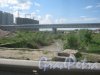 Река Красненькая. Вид в сторону Финского залива с ул. Доблести. Фото 30 мая 2013 г.