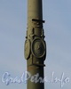 Элементы декора стойки фонаря Ушаковского моста. Фото апрель 2010 г.