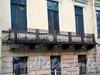 Наб. Ново-Адмиралтейского канала, д. 6. Решетка балкона центральной части фасада. Фото июнь 2010 г.