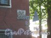 Знак Осоавиахима на стене дома 7а по Урюпину пер. Фото 13 июня 2012 г. с Охотничьего пер.