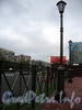 Памятник С. А. Есенину на пересечении Северного проспекта и улицы Есенина. Фонари и решетка. Фото октябрь 2009 г.