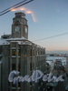Вид на башню с часами дома 4 по Апраксину переулку и на Апракин Двор из окон дома напротив. Фото 2011 г.
