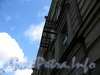 Рижский пр., д. 32. Бывший доходный дом. Решетка балкона. Фото июль 2009 г.