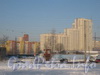 Строющийся дом 99 по Ленинскому пр., дом 99 (справа) и дом 43, корп. 1 по пр. Маршала Жукова. Вид от трамвайной остановки «пр. Стачек, 111». Фото январь 2012 г.