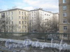 Пр. Стачек, дом 75. Общий вид части жилого дома (в центре) с путепровода Кронштадтской ул. Слева дом 26, справа - часть дома 28 по Кронштадтской ул. Фото март 2012 г.