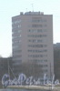 Пр. Ветеранов, дом 100. Общий вид с моста Бурцева. Фото март 2012 г.