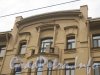 Кронверкский пр., дом 59. Фрагмент верхней части фасада. Фото 26 июня 2012 г.