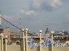 Каменноостровский пр., дом 38 (в центре Фото розовое здание с чёрной башенкой). Вид из окна парадной дома 29/37, литера Б по Кронверкской ул. Фото 7 июля 2012 г.
