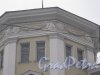 Тихорецкий пр., дом 22/13. Фрагмент верхней центральной части фасада. Фото 8 февраля 2013 г.